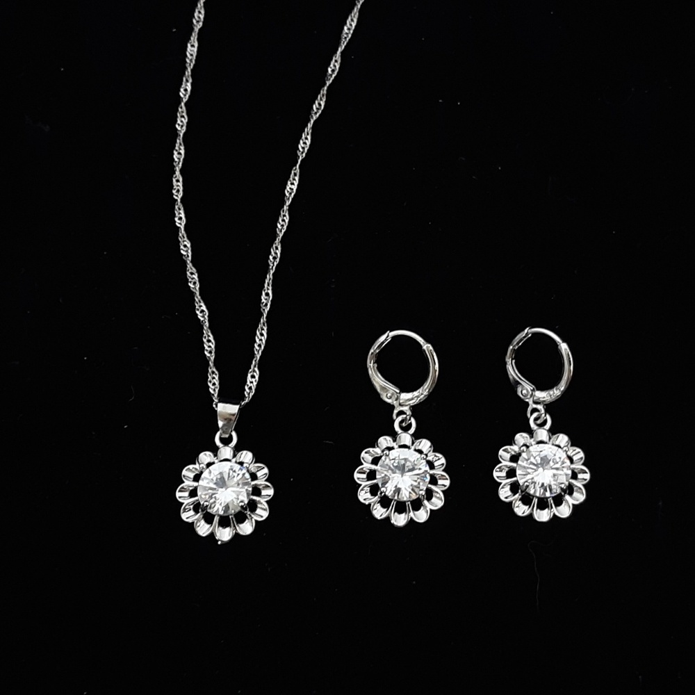 Stamped. 925 Silver necklace and earrings set